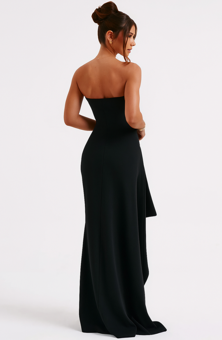 "Elegant off-shoulder twisted navy maxi dress with fluid silhouette, perfect for evening wear and special occasions."
