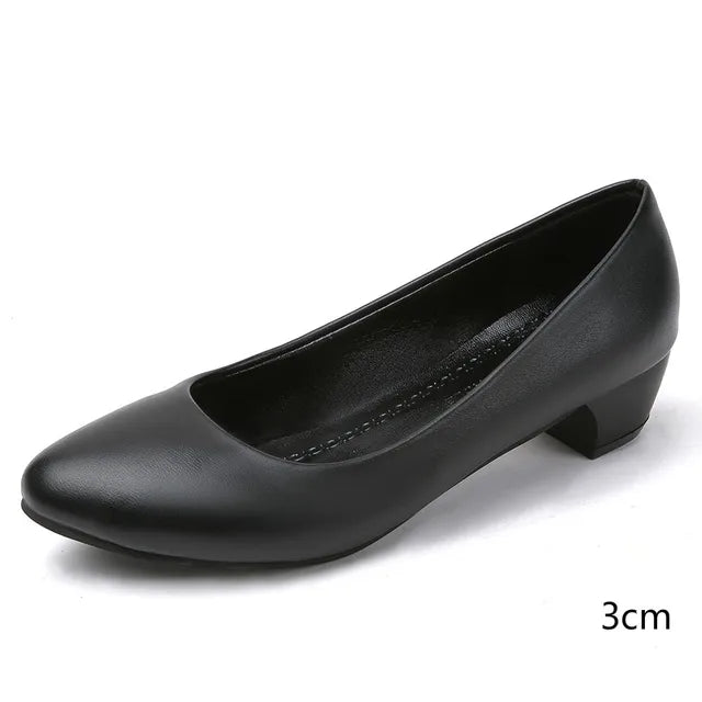 "Elegant orthopedic black women's pumps, sleek design with cushioned support for style and comfort."