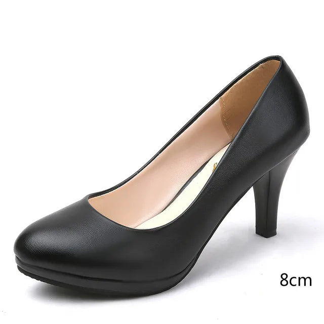"Elegant orthopedic black women's pumps, sleek design with cushioned support for style and comfort."