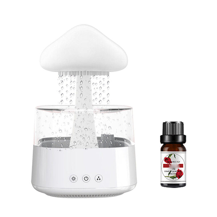 "Elegant white humidifier with wooden finish, emits soothing mist and rain sounds for relaxation and improved sleep."