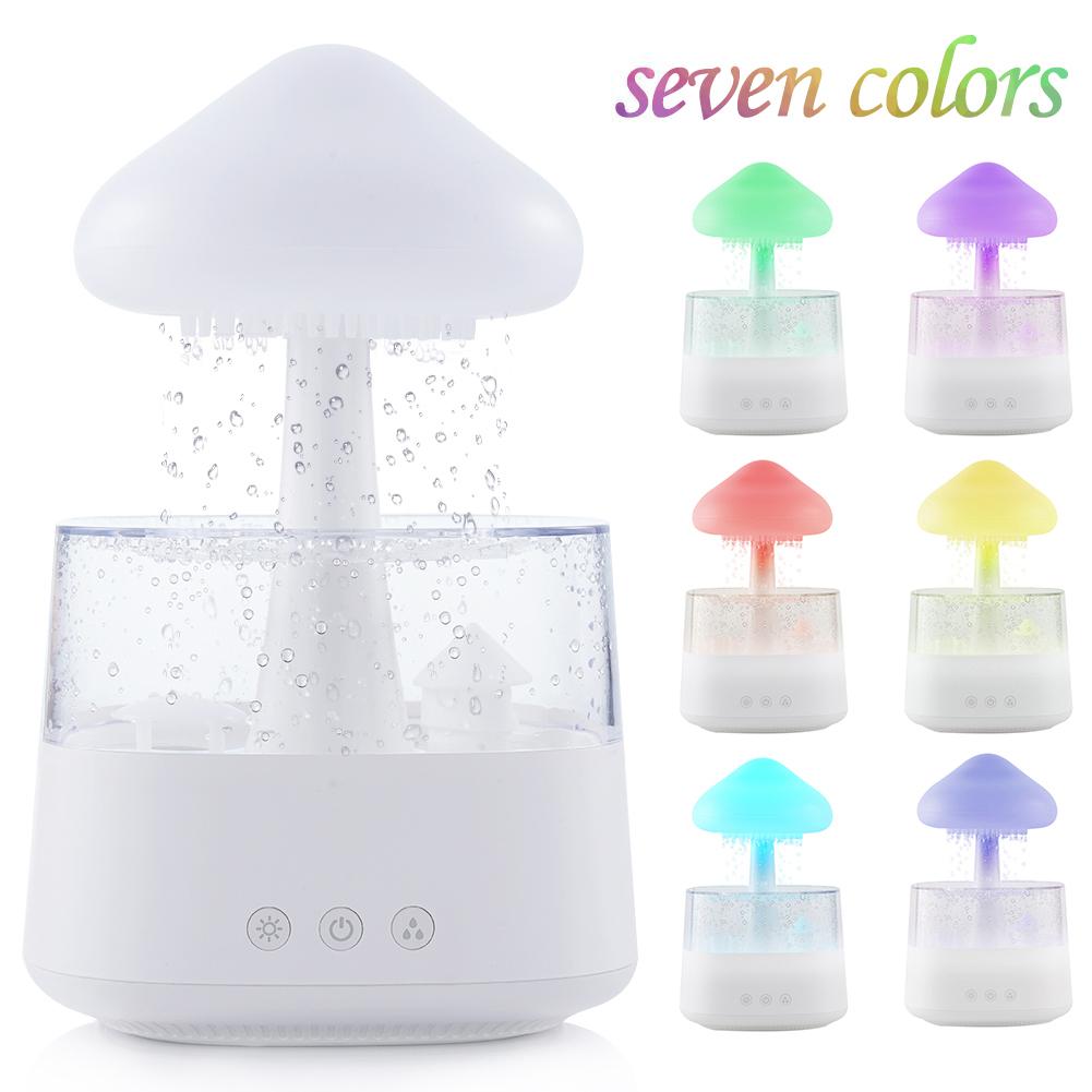 "Elegant white humidifier with wooden finish, emits soothing mist and rain sounds for relaxation and improved sleep."