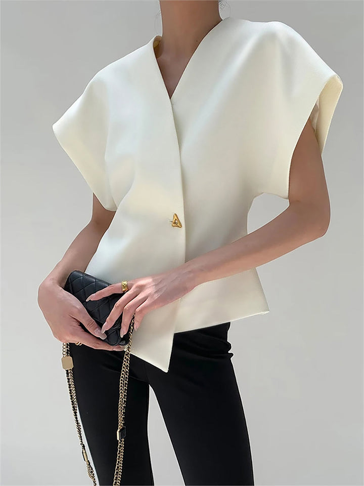 "Elegant women's V-neck blouse with buttons, tailored fit, chic button-down design, ideal for versatile stylish outfits."