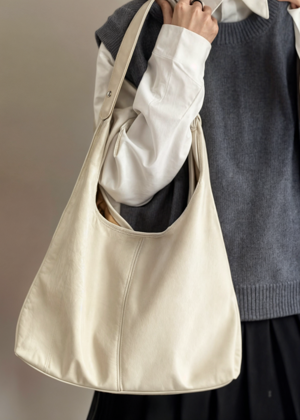 Elegant women's vegan leather tote handbag, spacious, vintage design, in brown, perfect for style and practicality.