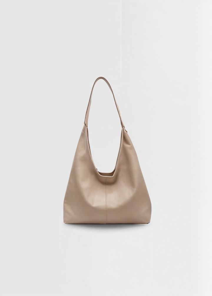 Elegant women's vegan leather tote handbag, spacious, vintage design, in brown, perfect for style and practicality.