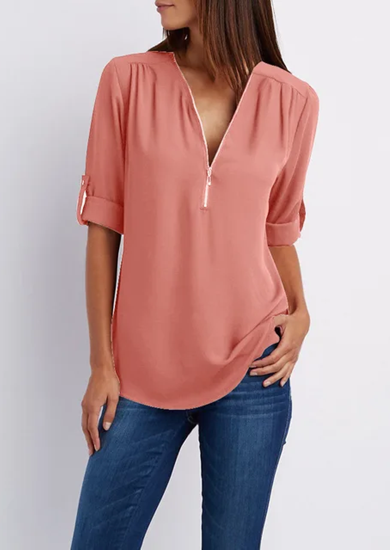 Elegant women's zipper blouse with chic modern design, flattering fit. Perfect for casual or formal occasions.