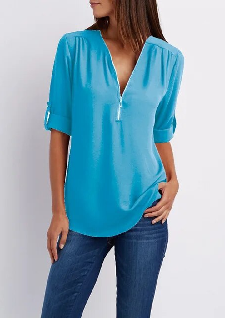 Elegant women's zipper blouse with chic modern design, flattering fit. Perfect for casual or formal occasions.