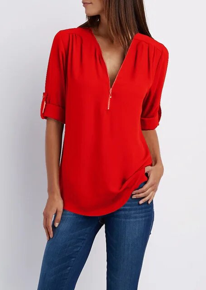 Elegant women's zipper blouse with chic modern design, flattering fit. Perfect for casual or formal occasions.