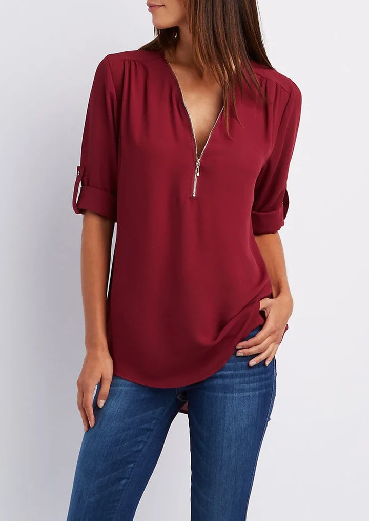 Elegant women's zipper blouse with chic modern design, flattering fit. Perfect for casual or formal occasions.