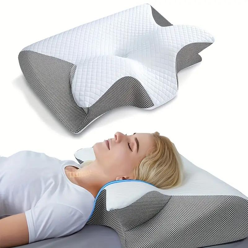 "Ergonomic butterfly memory foam neck pillow for side & back sleepers, in black or grey, promotes spinal alignment & comfort.