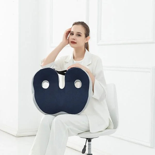"Ergonomic memory foam sit bone relief cushion for office or car, contoured for tailbone support, adjustable firmness."