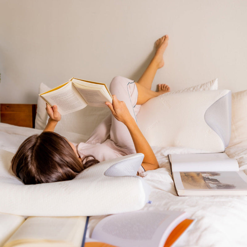 Ergonomic orthopaedic neck pain pillow in blue, offering sleep support for side, back, and stomach sleepers, enhancing comfor