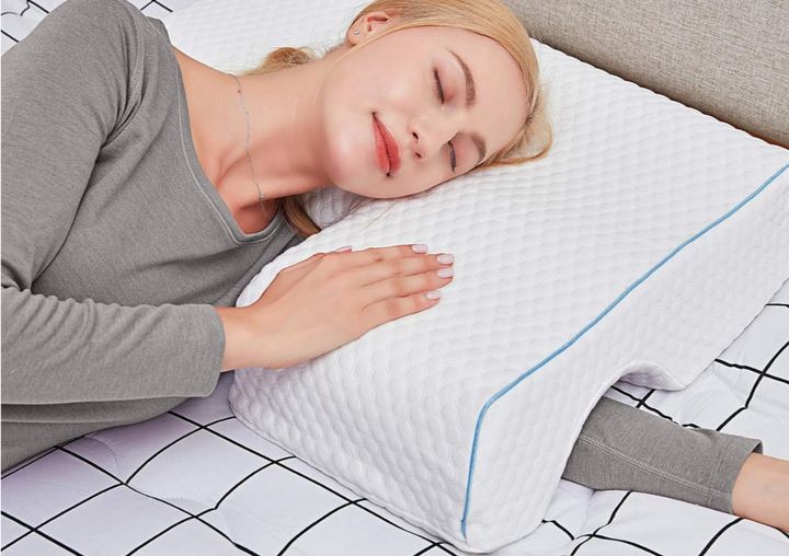 Gel-infused shoulder relief pillow with cooling foam, designed for side sleepers, showcasing unique arm pocket for comfort.