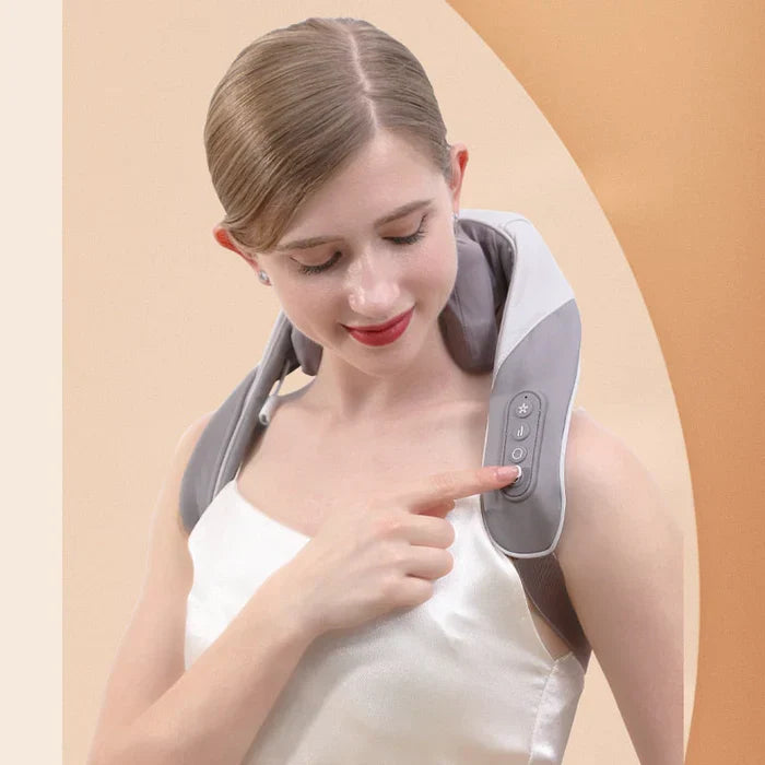 Heated neck and shoulder massager for deep relaxation, mimics human hands, portable, with adjustable heat and intensity.