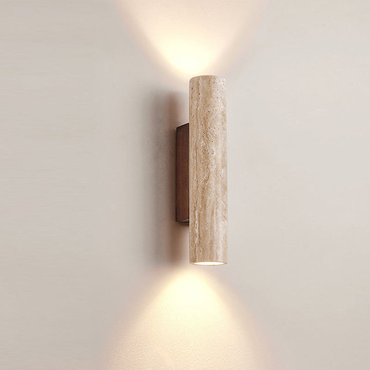 Japandi minimalist travertine stone wall lamp with natural beige finish, conveys elegance with its sleek design and warm glow