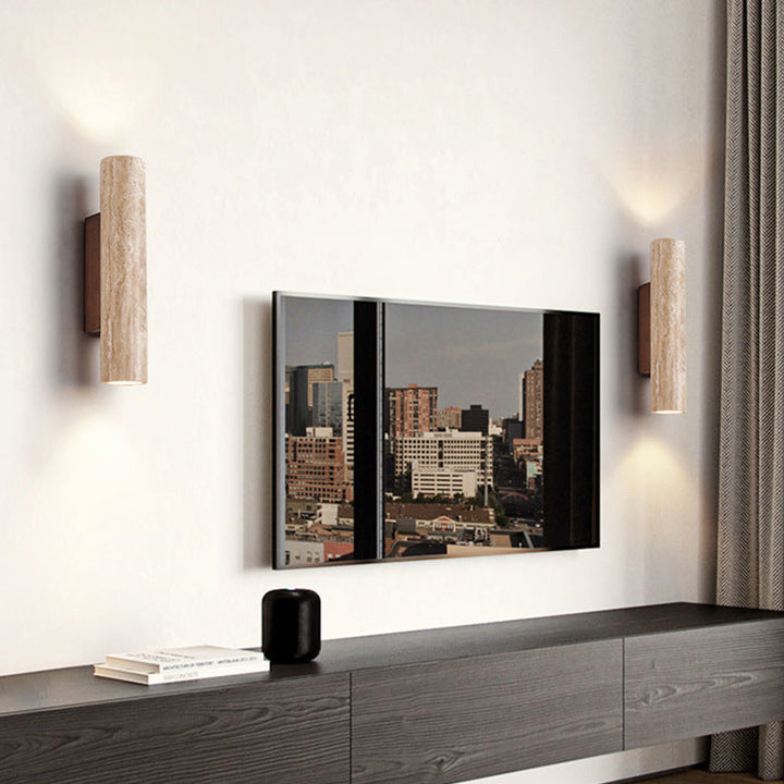Japandi minimalist travertine stone wall lamp with natural beige finish, conveys elegance with its sleek design and warm glow