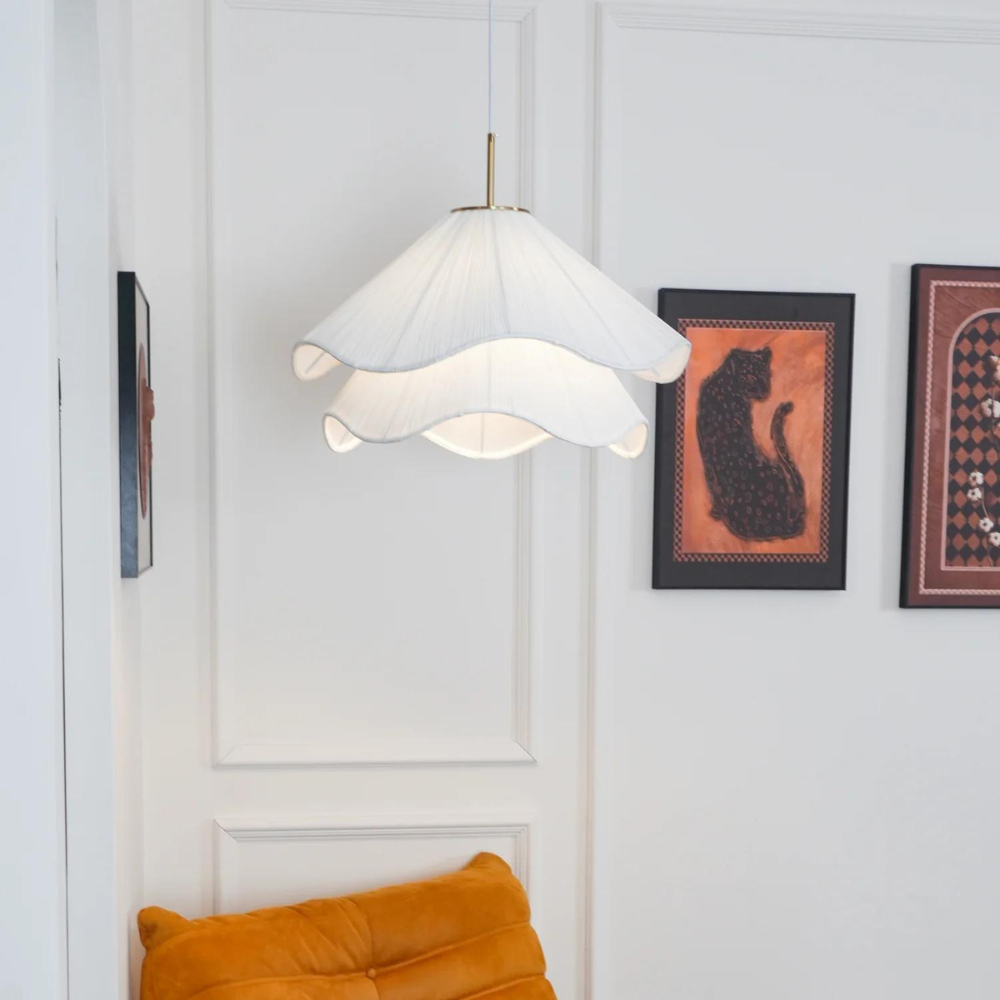 "Japandi pendant light with fabric shade, iron frame, warm ambient glow; modern elegant design for diverse interiors."