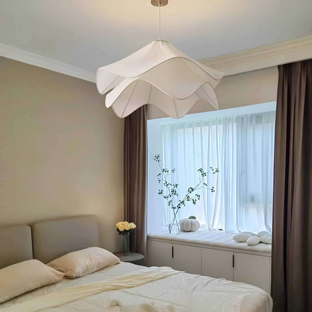 "Japandi pendant light with fabric shade, iron frame, warm ambient glow; modern elegant design for diverse interiors."