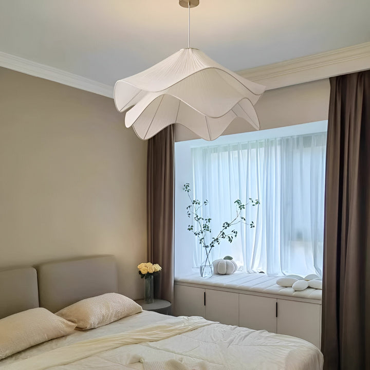 "Japandi pendant light with fabric shade, iron frame, warm ambient glow; modern elegant design for diverse interiors."