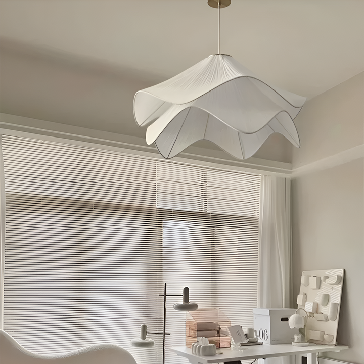 "Japandi pendant light with fabric shade, iron frame, warm ambient glow; modern elegant design for diverse interiors."