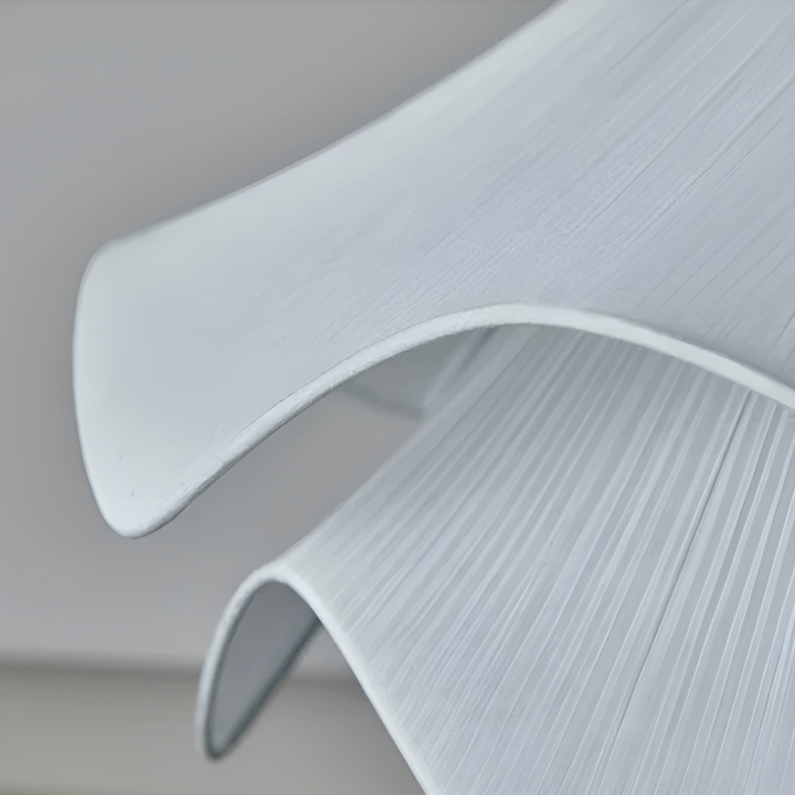 "Japandi pendant light with fabric shade, iron frame, warm ambient glow; modern elegant design for diverse interiors."