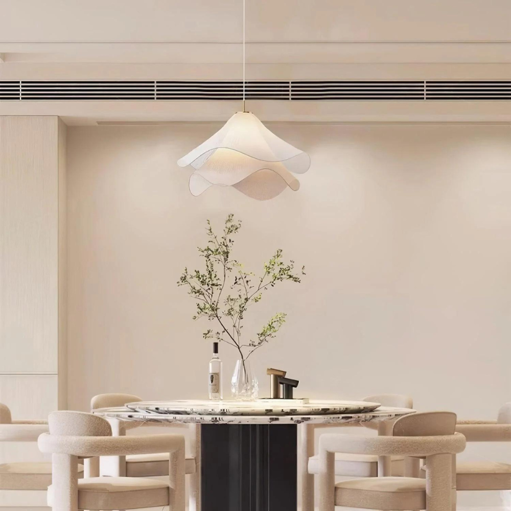 "Japandi pendant light with fabric shade, iron frame, warm ambient glow; modern elegant design for diverse interiors."