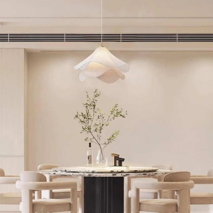 "Japandi pendant light with fabric shade, iron frame, warm ambient glow; modern elegant design for diverse interiors."