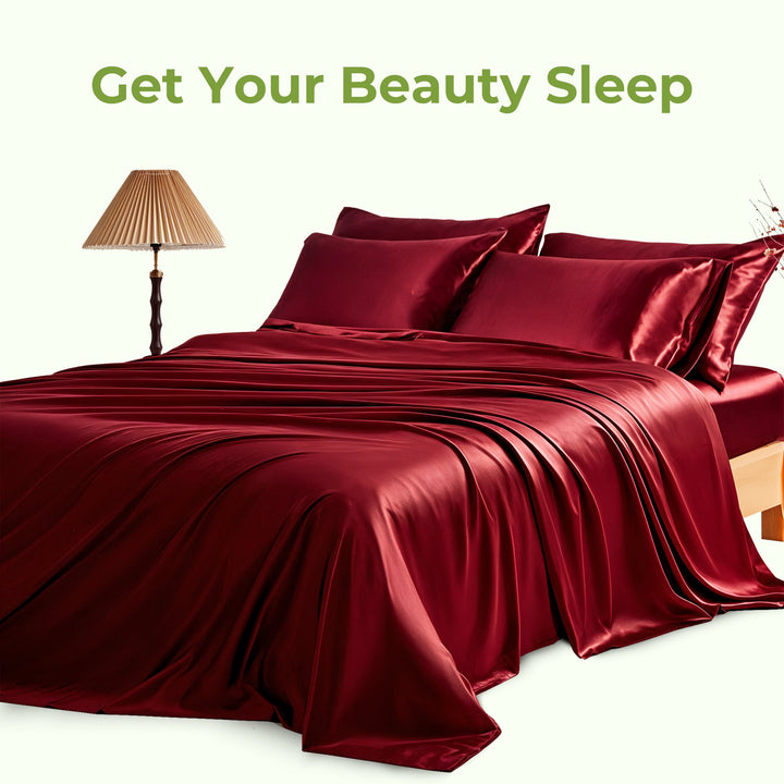 "Luxurious full size satin sheets with deep pockets, silky sheen in elegant colors, draped beautifully on a bed."