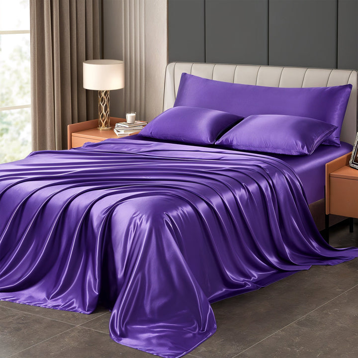 "Luxurious full size satin sheets with deep pockets, silky sheen in elegant colors, draped beautifully on a bed."