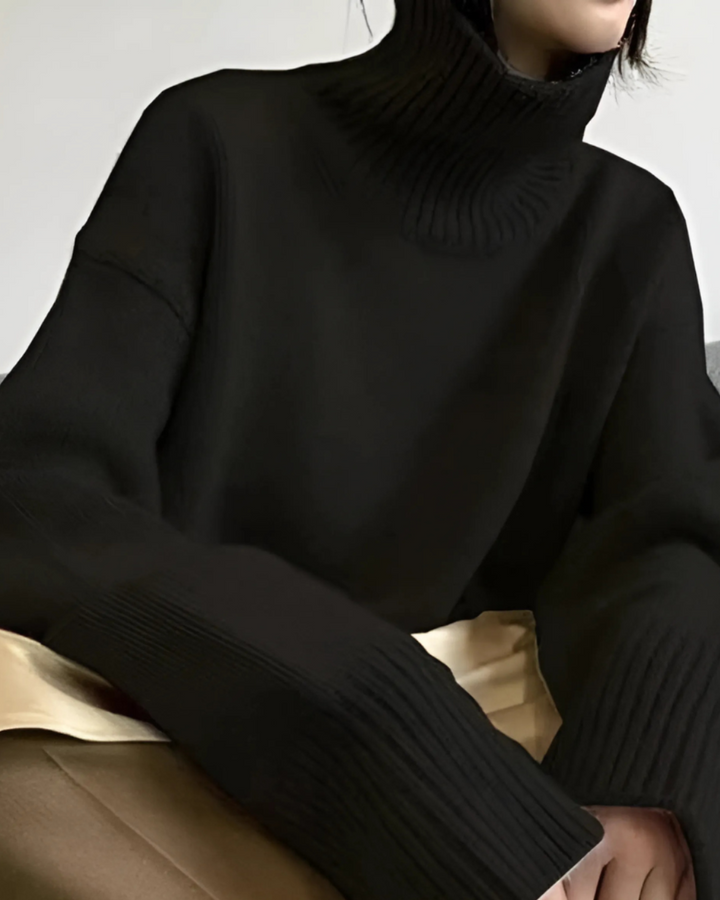 Luxurious women's cashmere turtleneck sweater, classic design, soft texture, warm, ideal for elegant winter outfits.