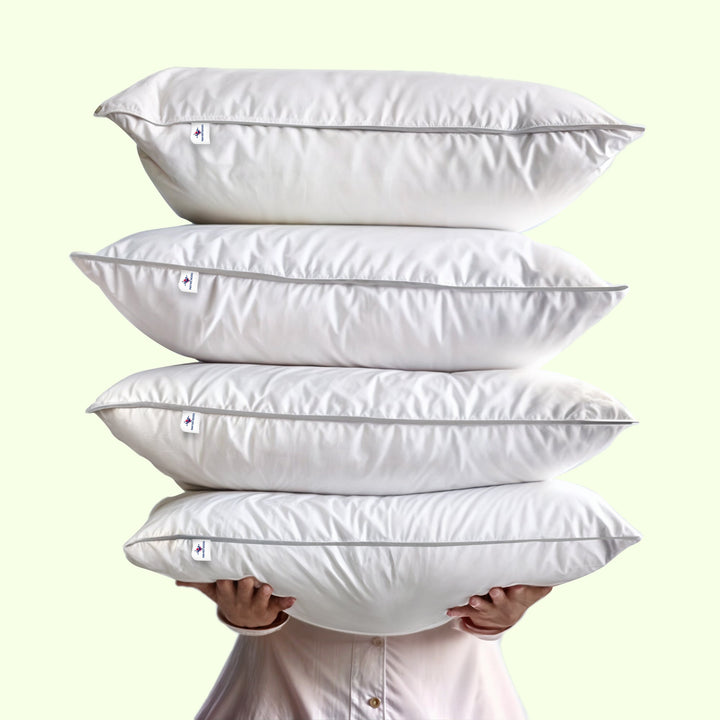 "Luxury bed pillow with cooling down alternative and feathers, plush white texture for ultimate comfort and support."