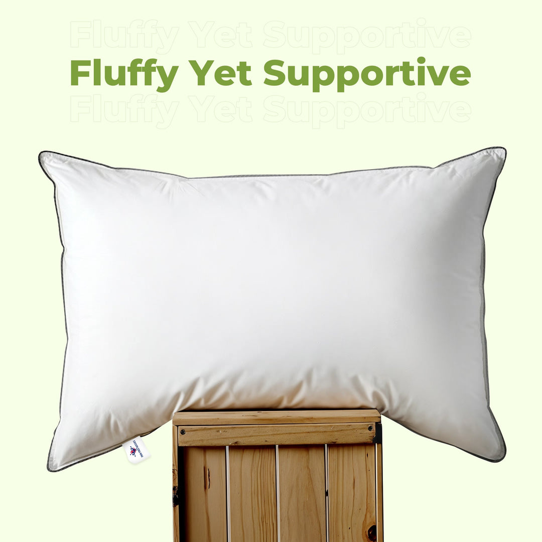 "Luxury bed pillow with cooling down alternative and feathers, plush white texture for ultimate comfort and support."