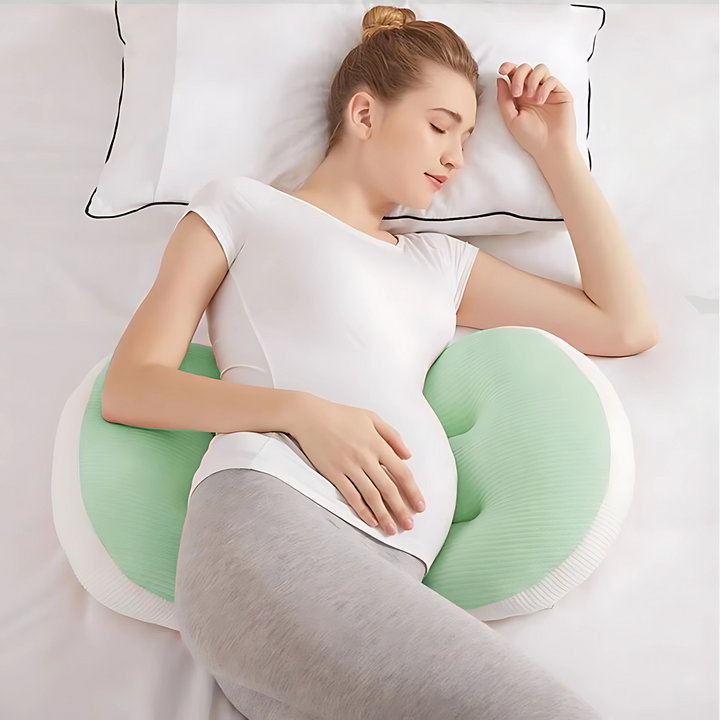 "Maternity Butterfly Pillow in soft blue and white, dual wings for belly and back support, promotes optimal side sleeping."