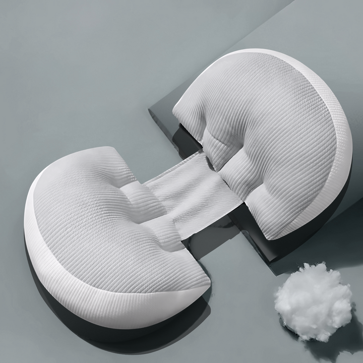 "Maternity Butterfly Pillow in soft blue and white, dual wings for belly and back support, promotes optimal side sleeping."