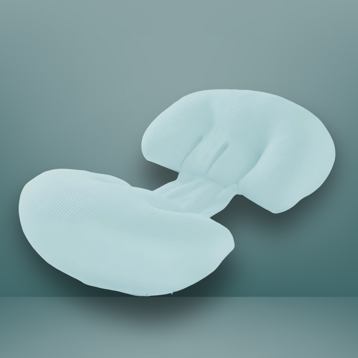 "Maternity Butterfly Pillow in soft blue and white, dual wings for belly and back support, promotes optimal side sleeping."