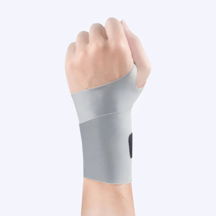 "Men's adjustable wrist support brace, black breathable fabric, sleek design, for pain relief, carpal tunnel and strain."