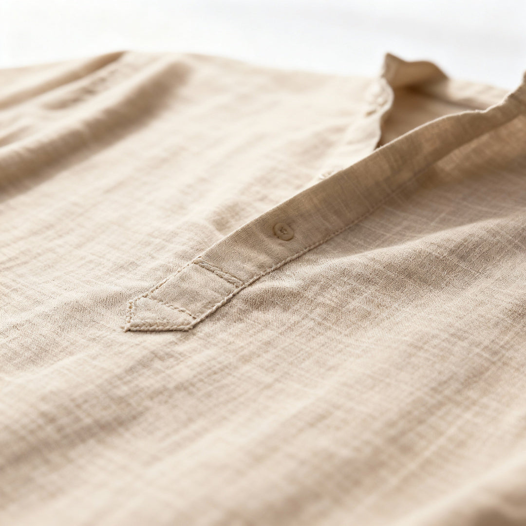 "Men's linen long sleeve polo with chino collar, half button-up design, classic fit, in timeless muted colors"