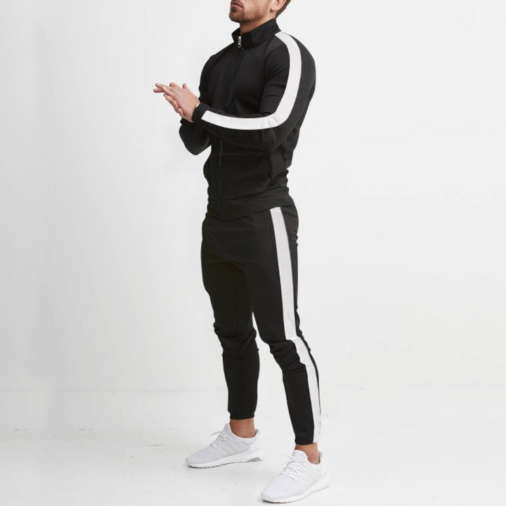 Men's luxury jogging set in grey, made from smooth polyester, featuring a tailored modern fit and elastic waistband.