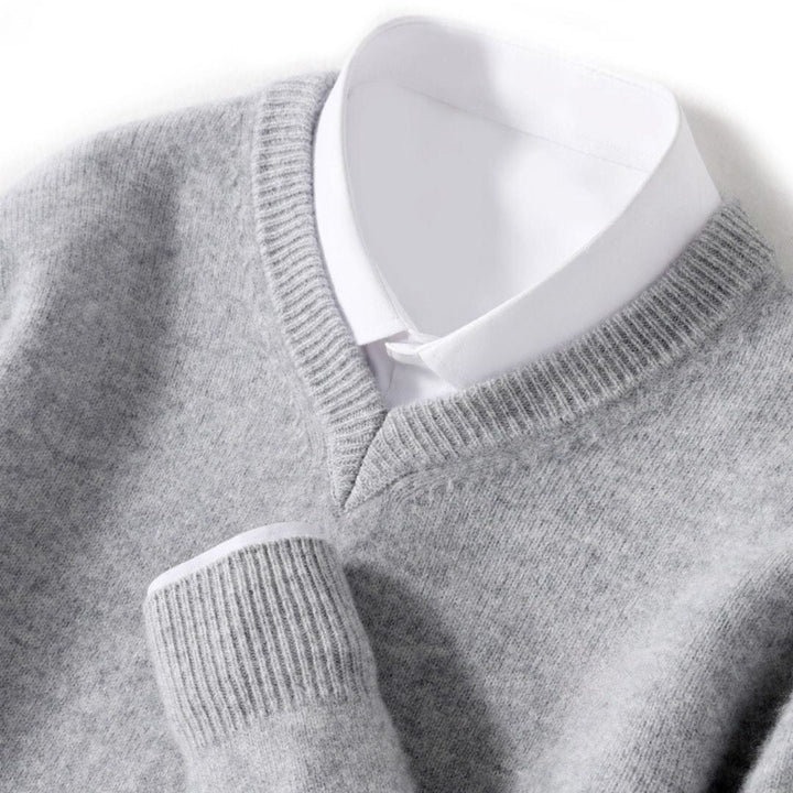 "Men's soft Merino V-Neck sweater, sleek modern design, ultra-comfortable fit, essential for style-conscious wardrobes."
