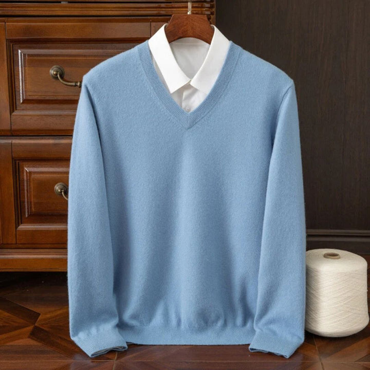 "Men's soft Merino V-Neck sweater, sleek modern design, ultra-comfortable fit, essential for style-conscious wardrobes."