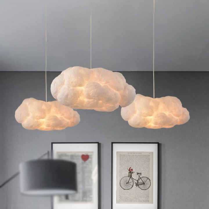 "Modern LED pendant light with cloud-like design, made of PVC and cotton, ideal for interiors. Nimbus style for cozy ambiance