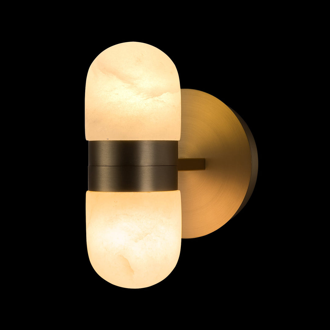 Modern brass wall lamp featuring snow-white alabaster shades with brown veining; elegant indoor lighting fixture.