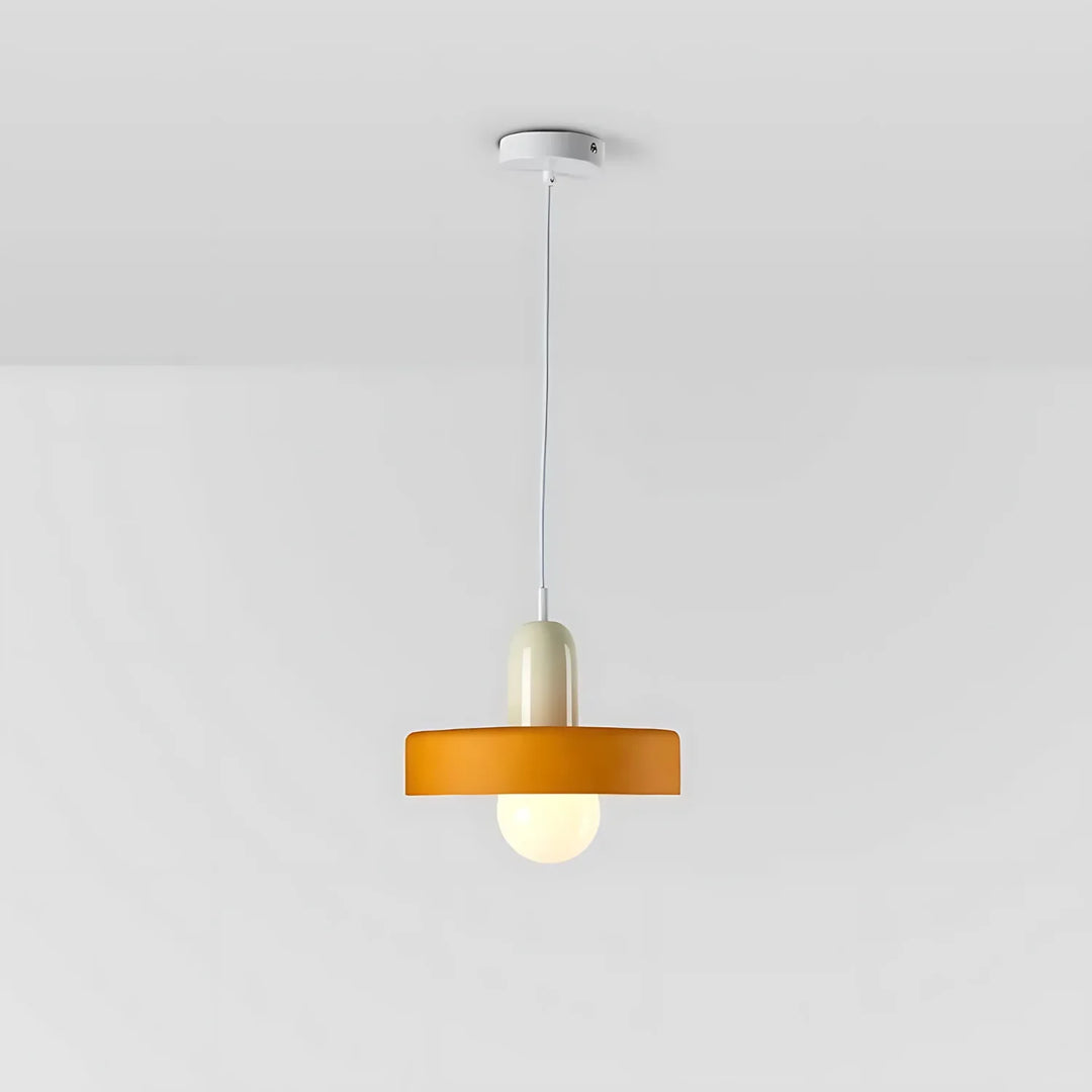 "Modern glass pendant light with sleek glass, brushed metal, ideal for elegant interiors, adds sophistication and warmth."