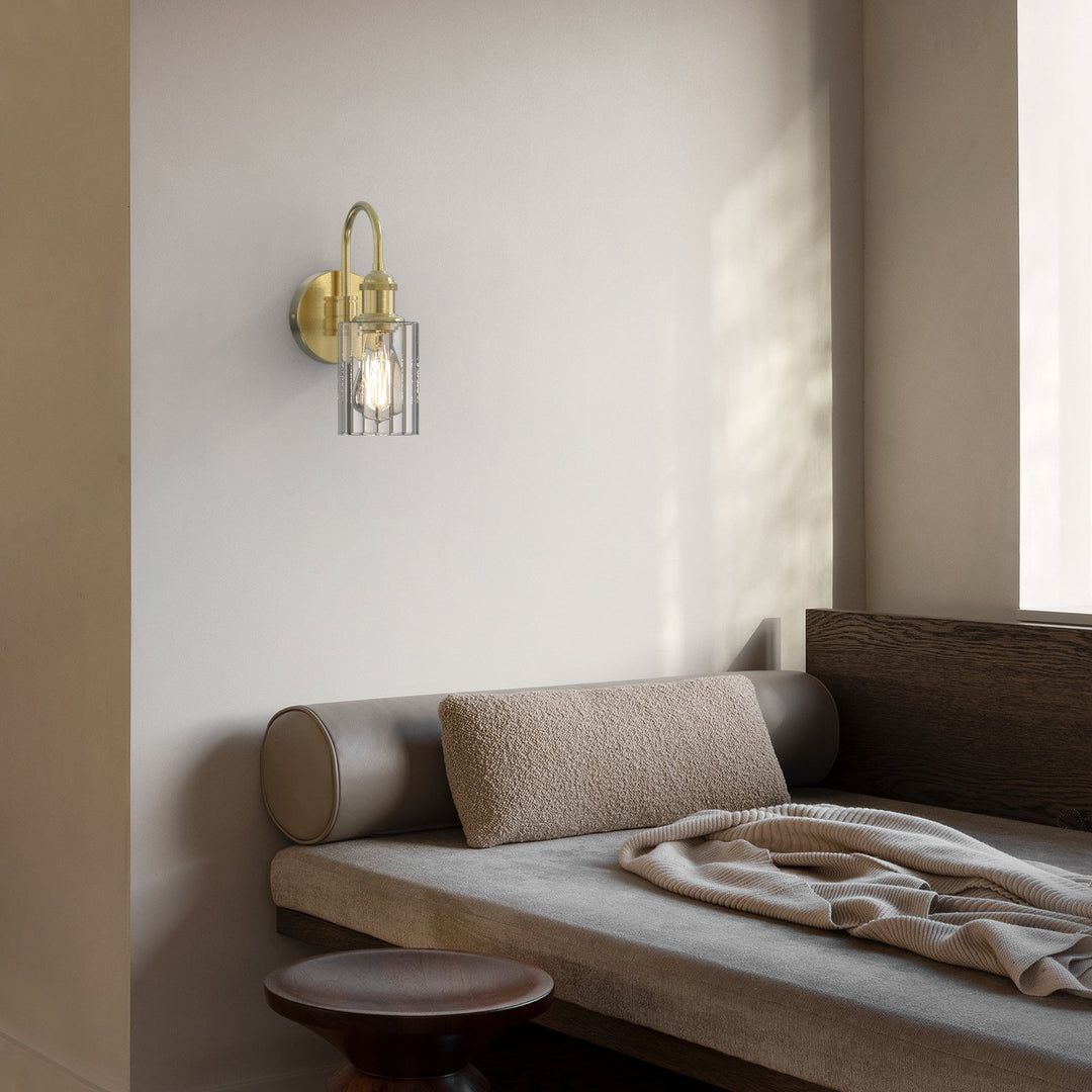 Modern glass wall light with metal frame, glass shade; E27 bulb holder; side profile; elegant design for interior spaces.