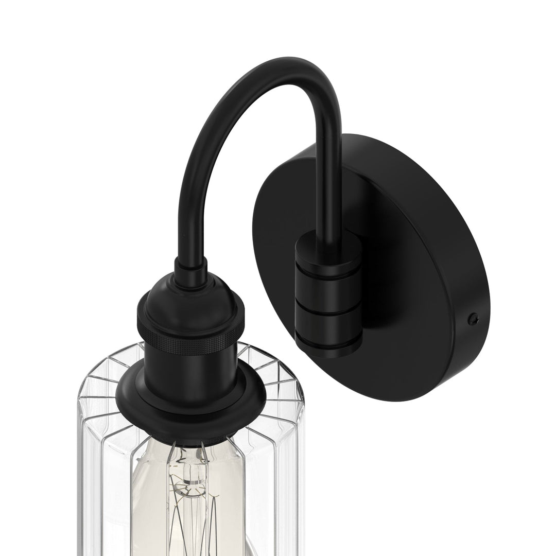 Modern glass wall light with metal frame, glass shade; E27 bulb holder; side profile; elegant design for interior spaces.