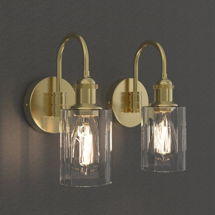 Modern glass wall light with metal frame, glass shade; E27 bulb holder; side profile; elegant design for interior spaces.