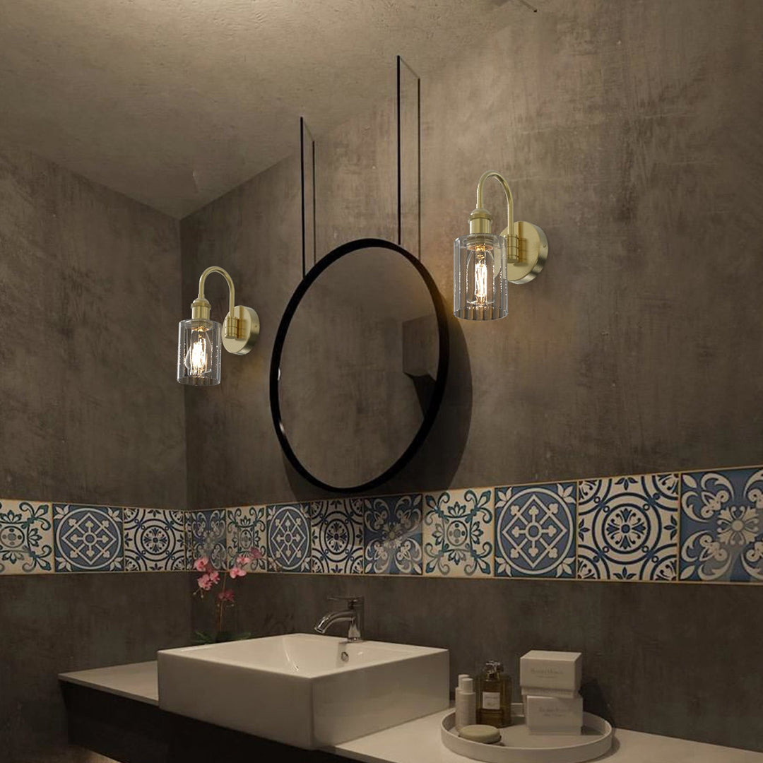 Modern glass wall light with metal frame, glass shade; E27 bulb holder; side profile; elegant design for interior spaces.