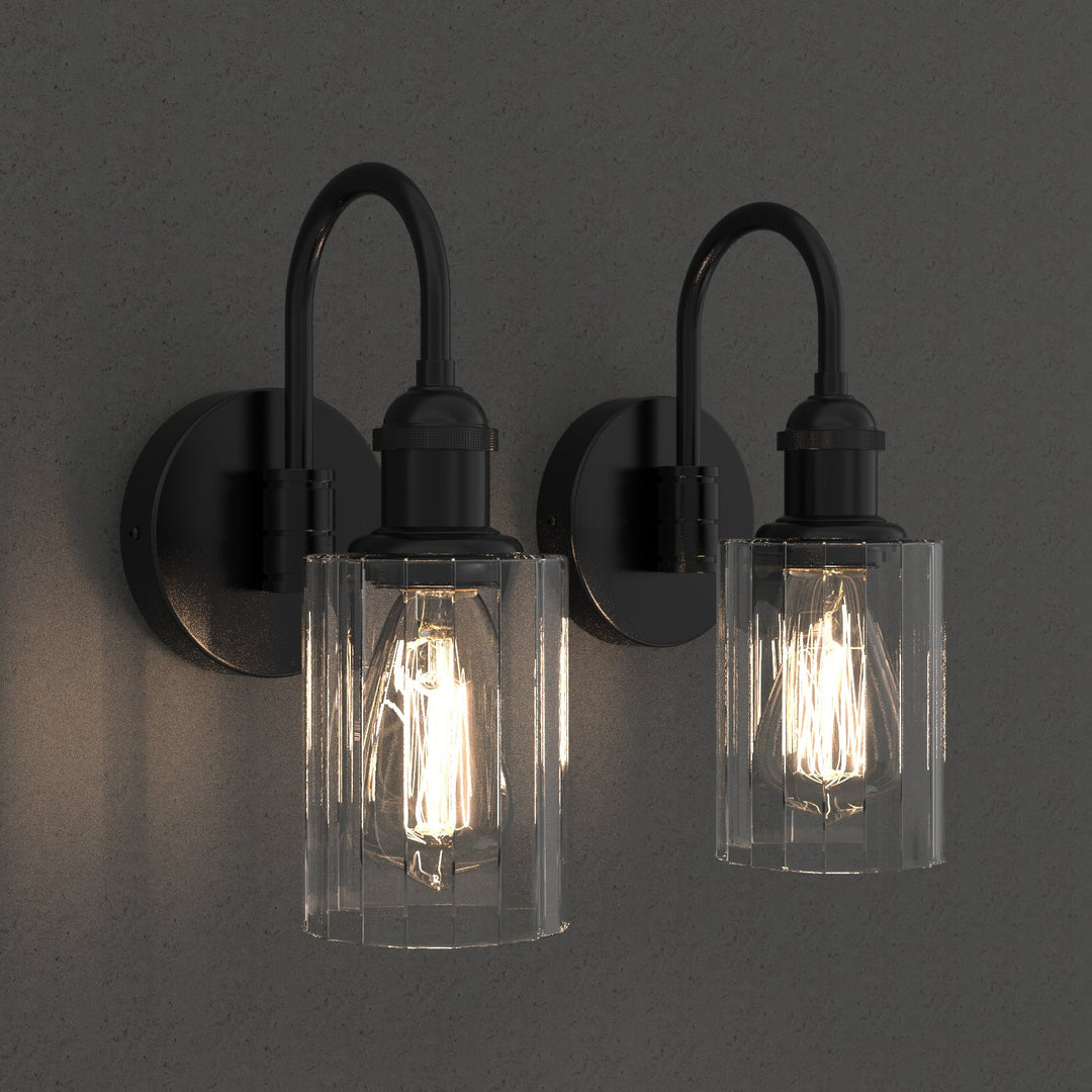 Modern glass wall light with metal frame, glass shade; E27 bulb holder; side profile; elegant design for interior spaces.