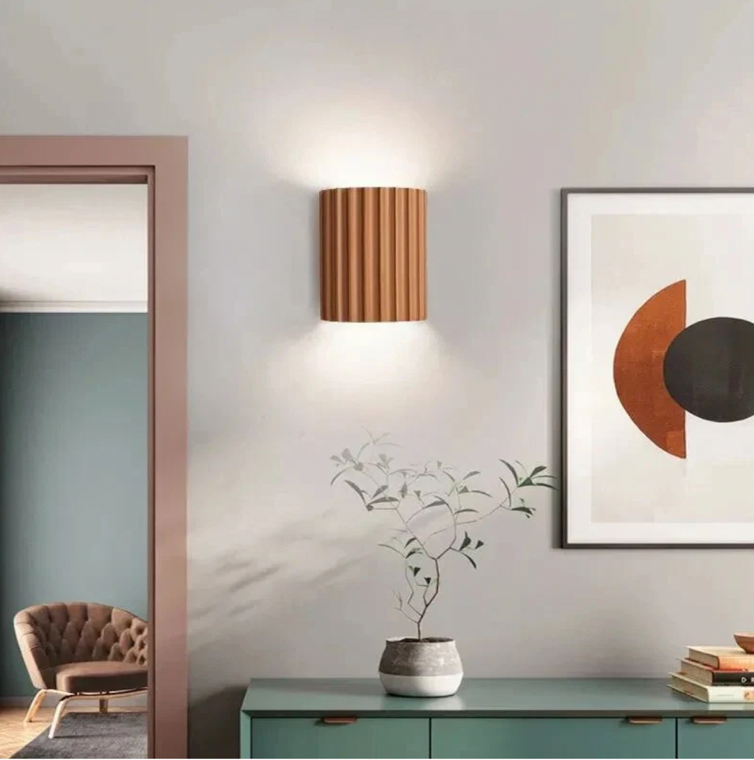 Modern resin wall lamp with artistic design, soft LED lighting, in white, green, grey, or orange for stylish home decor.