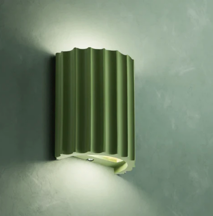 Modern resin wall lamp with artistic design, soft LED lighting, in white, green, grey, or orange for stylish home decor.