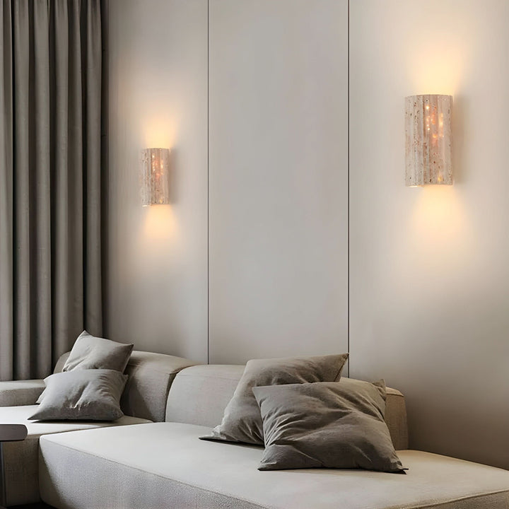 "Natural stone wall lamp with warm LED glow, showcasing organic texture and ambient lighting for modern interiors."